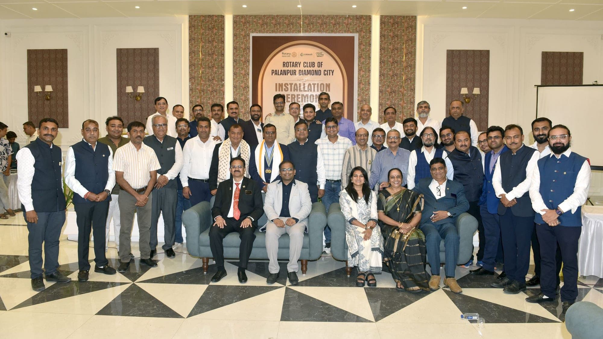Members of Rotary Club of Palanpur Diamond City gathered on stage at the installation ceremony